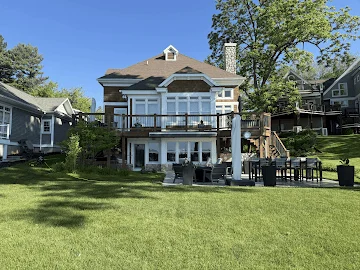 Large lakefront home exterior cleaned by Eagle Eye Cleaning