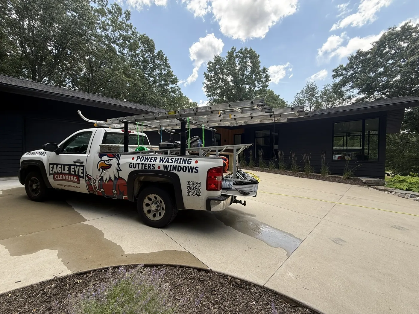 Eagle Eye Cleaning service truck parked at a residential job site